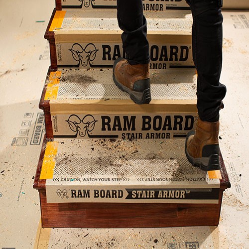 When you need dependable stair protection during construction, Ram Board Stair Armor has your back. Made with heavy-duty paperboard 4.5X thicker than builder’s paper, adjustable tread sizing, bullnose surface protection, and spill-resistant technology. RamBoard Stair Armor is an absolute must-have for temporary stair protection. Ram Board Stair Armor is perfect for high foot traffic areas on your jobsite due to its anti-slip properties.

Protect against water, paint spills, mud, and more in high-traffic areas of your construction project. Ram Board’s exclusive Spill Guard technology is woven into the fibers, allowing for extreme liquid holdout. Ram Board Stair Armor is reusable, recyclable, and made from recycled material.