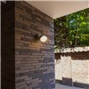 Make your garden an inviting place with this contemporary Dropsi wall lamp. The moveable spothead with connected LED module will accentuate your outdoor places.