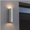 Magical wall light. The chrome coating makes it look like an invisible piece of lighting. Features a strong light beam up &amp; down and a vertical light-strip in the front. The effect will be amplified in a multiple arrangement.
