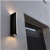 Magical wall light with black finish. Features a strong light beam up &amp; down and a vertical light-strip in the front. The effect will be amplified in a multiple arrangement.